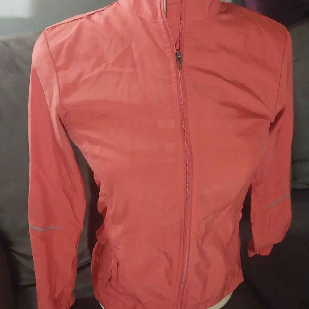New Balance Bright Coral Lightweight Jacket /Windbreaker. NWOT.